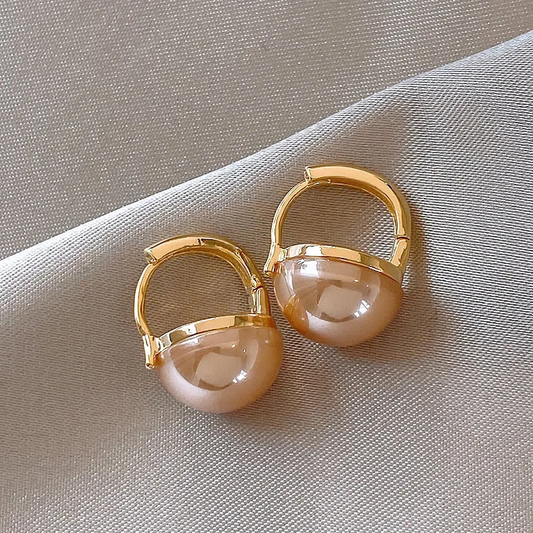 Boucles d'oreilles en or raffinées ornées de délicates perles roses