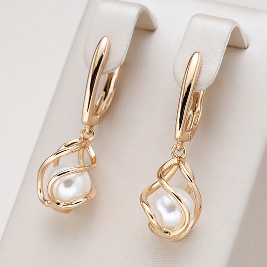 Boucles d'oreilles Élégantes en Or avec Perles Sophistiquées